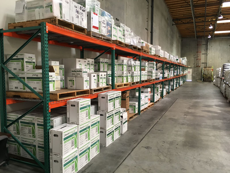 A picture containing text, warehouse  Description automatically generated